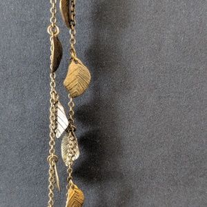 Gold feather necklace